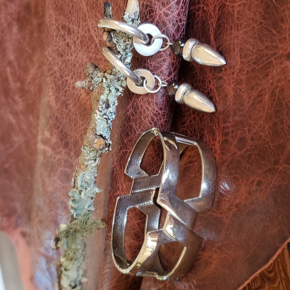 silver bracelet and earrings